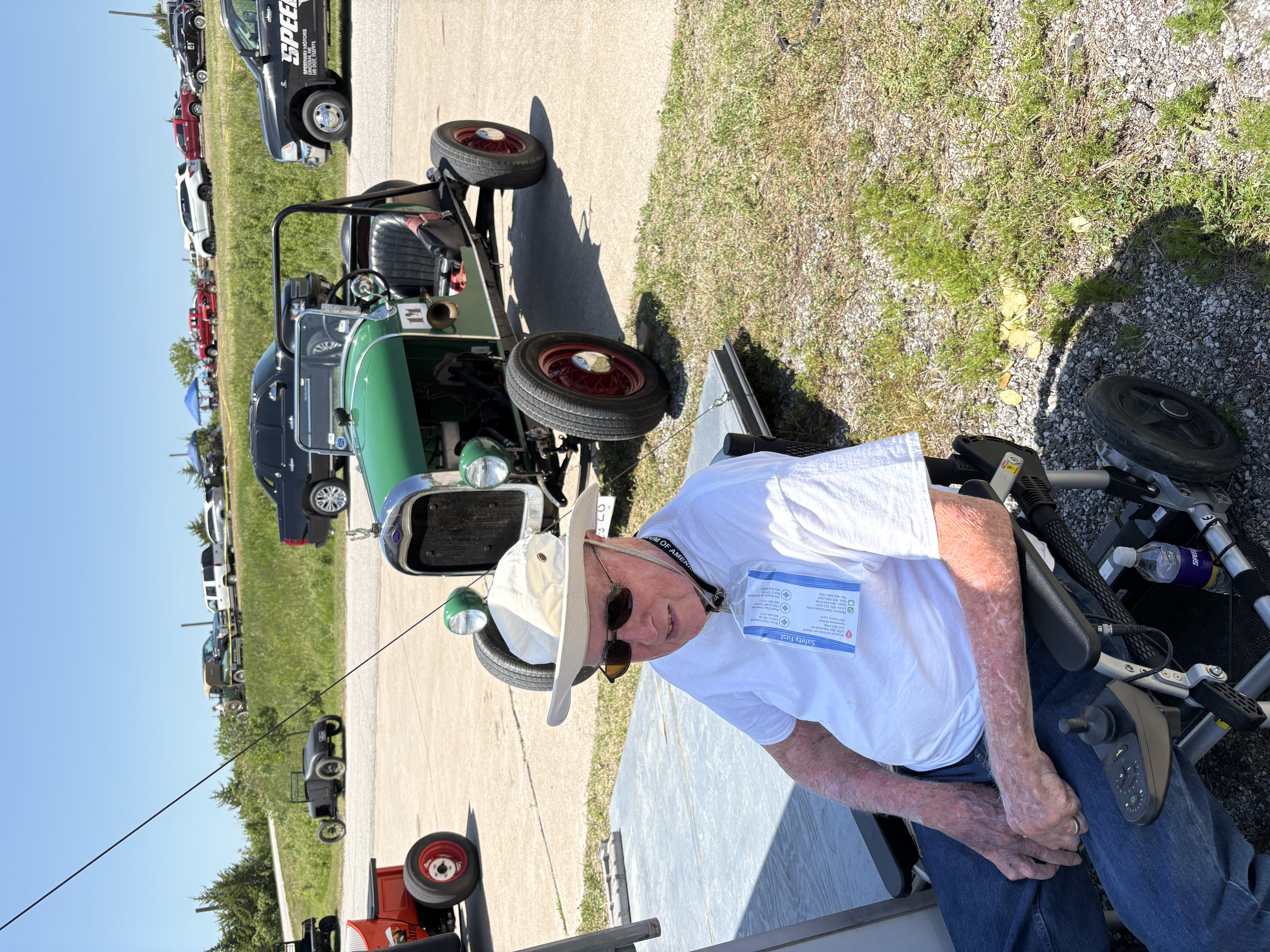 Founding Member Jim Brierley posing with his speedster